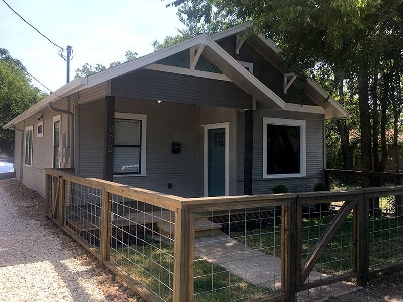 gray single story after renovation