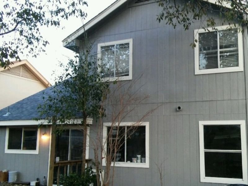 grey painted house back