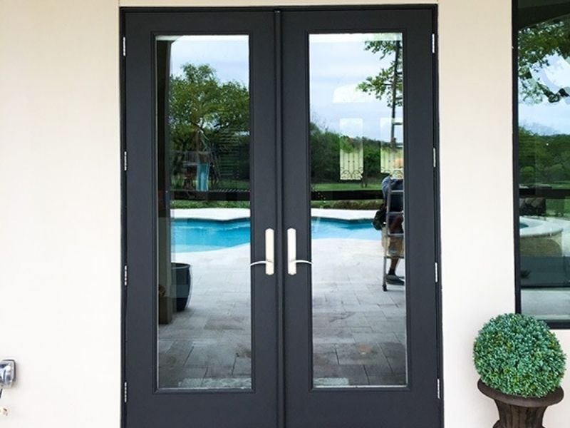 house painted tan with black accent door