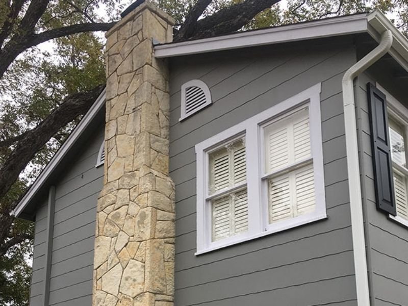 house painting grey paint stone chimney