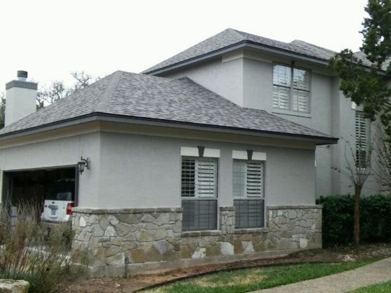off white home with natural stone