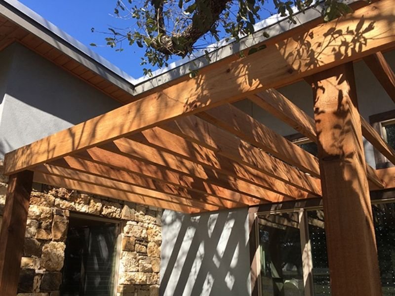 side view of pergola by pool