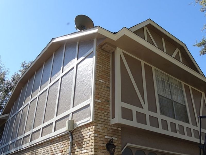 tan painted house white trim