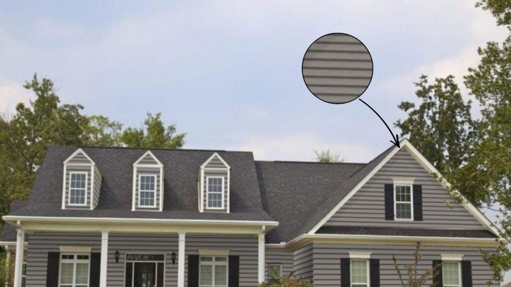 Light gray exterior siding with white trim
