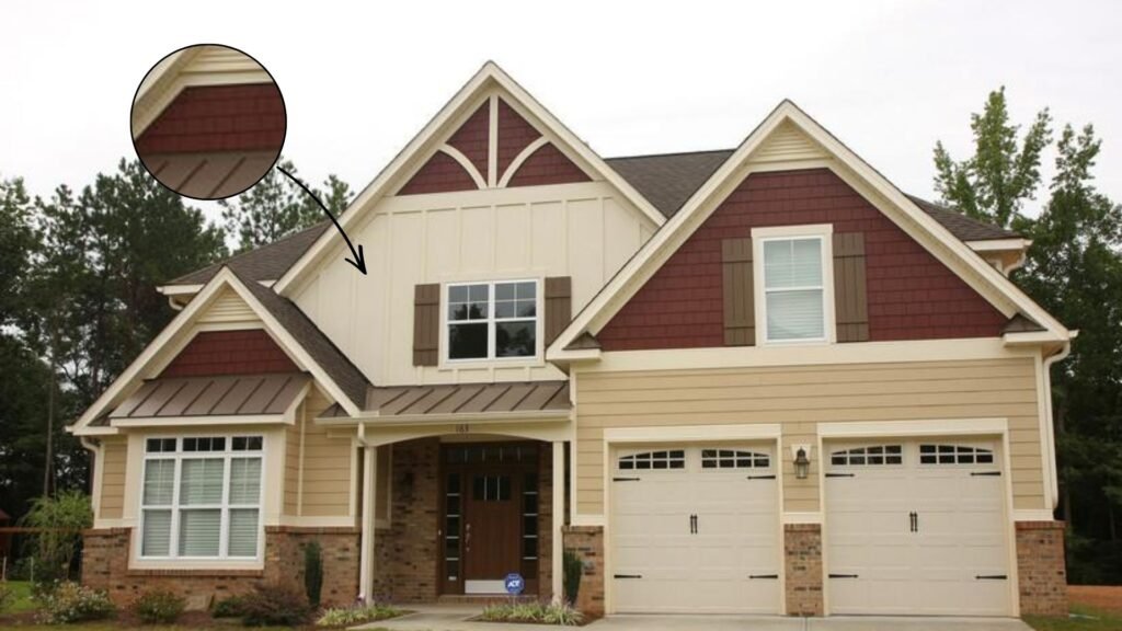 Modern house exterior with sandstone siding and dark red accent panels