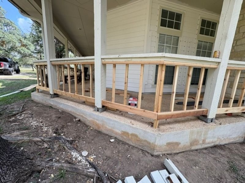Corner section of newly installed porch railing