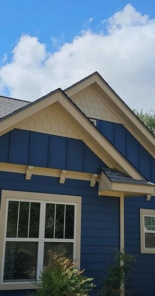 Freshly painted blue house siding and exterior wall