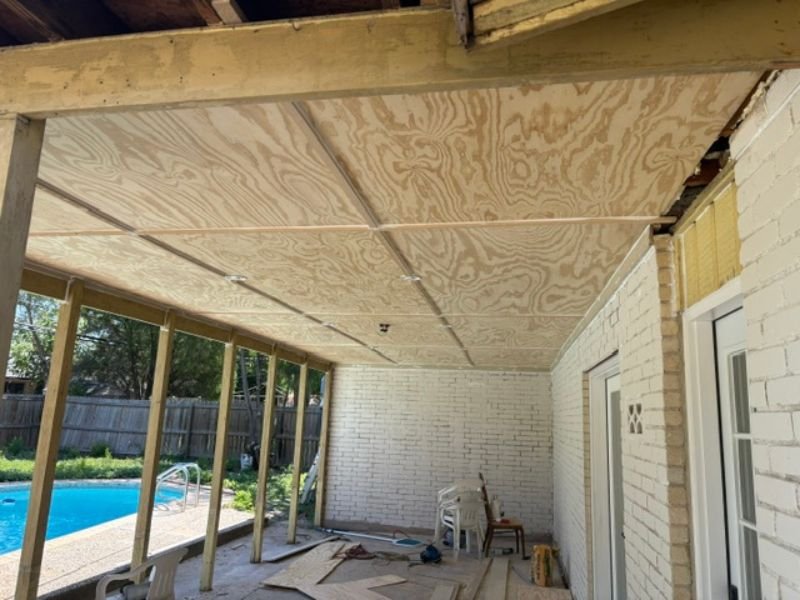 Plywood ceiling installed on covered patio