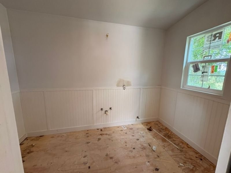 Unfinished laundry room